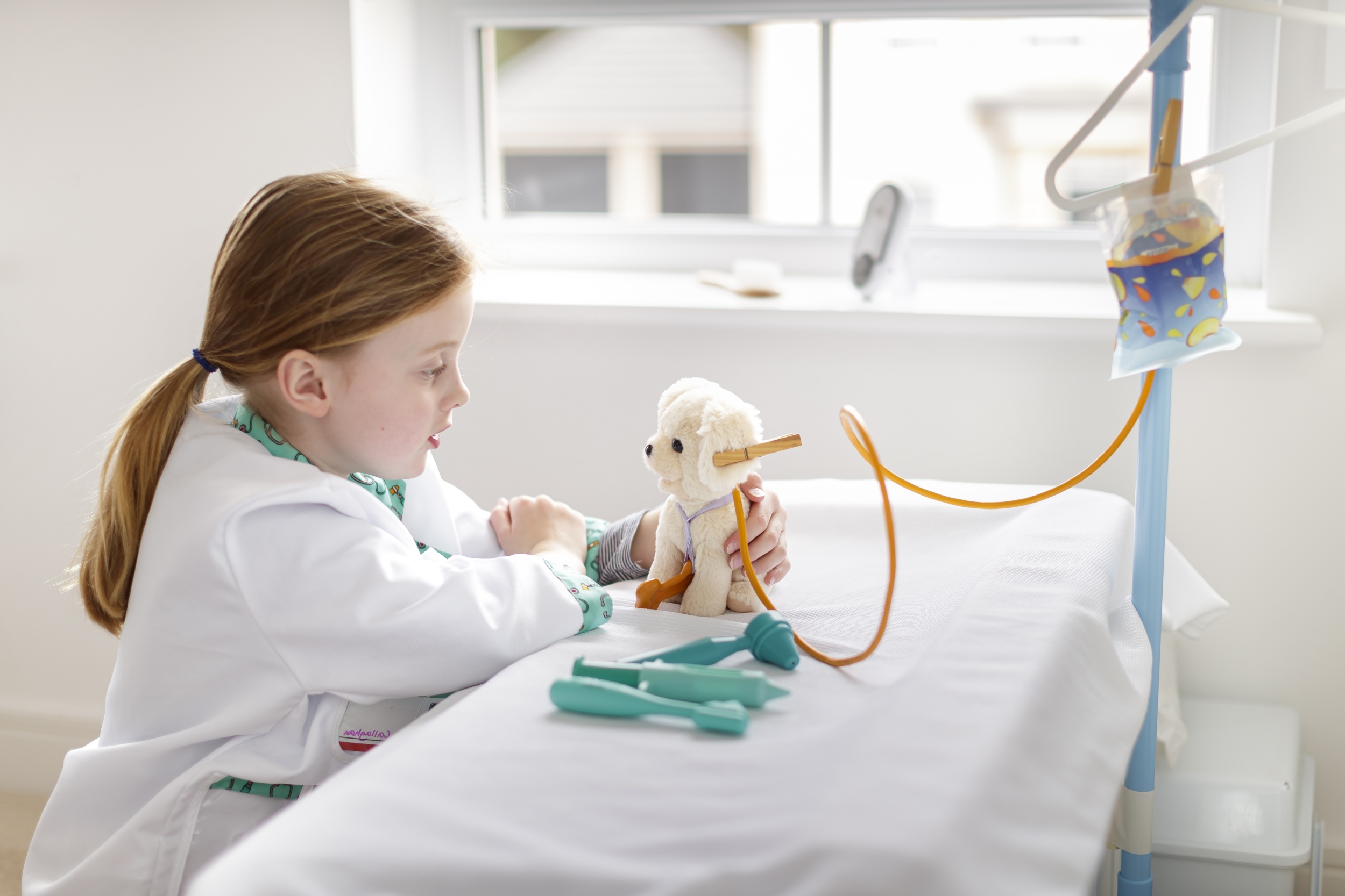 1 young-girl-dressed-as-doctor-pretending-treat-toy-dog-makebleieve-hospital-bed.jpg 1 young-girl-dressed-as-doctor-pretending-treat-toy-dog-makebleieve-hospital-bed.jpg