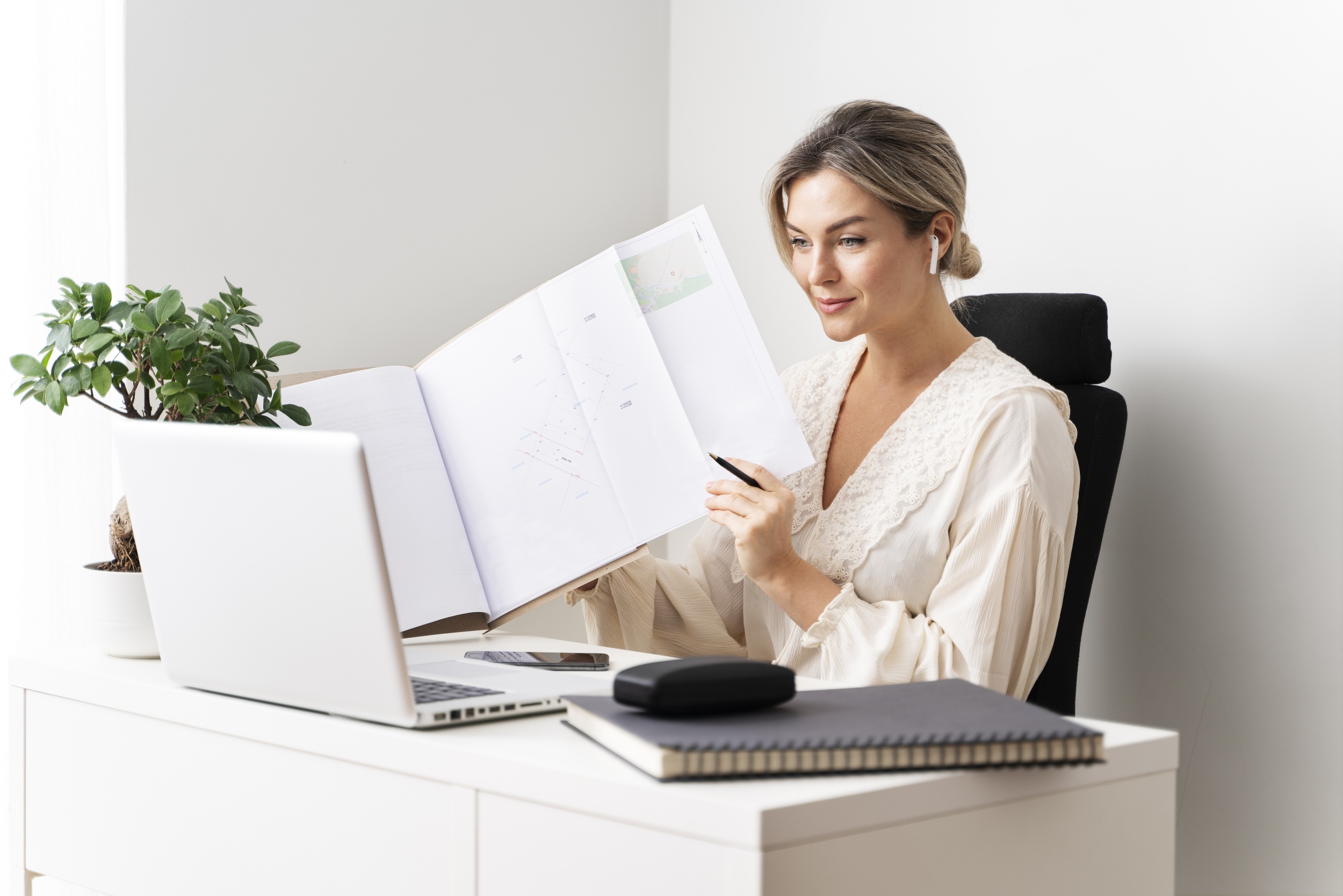 medium-shot-woman-sitting-desk.jpg