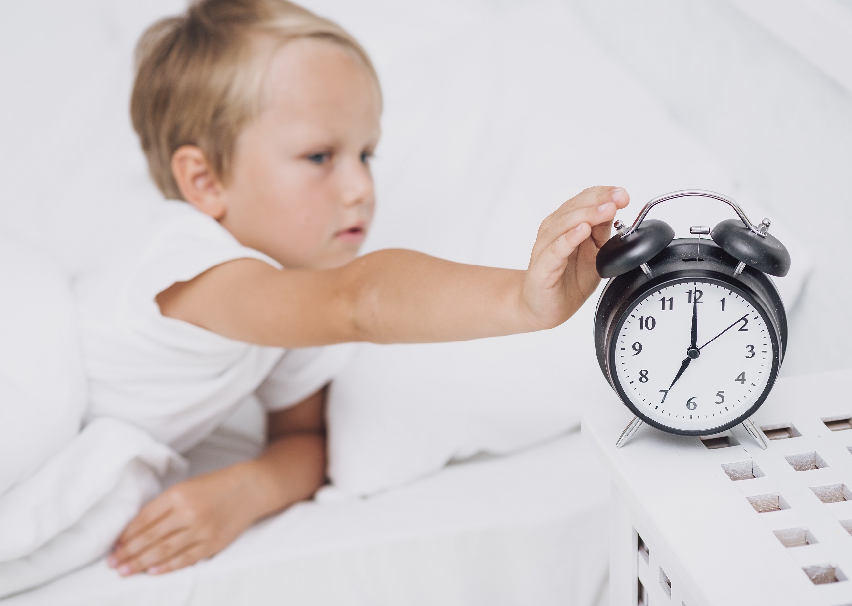 02 little-boy-stopping-alarm.jpg