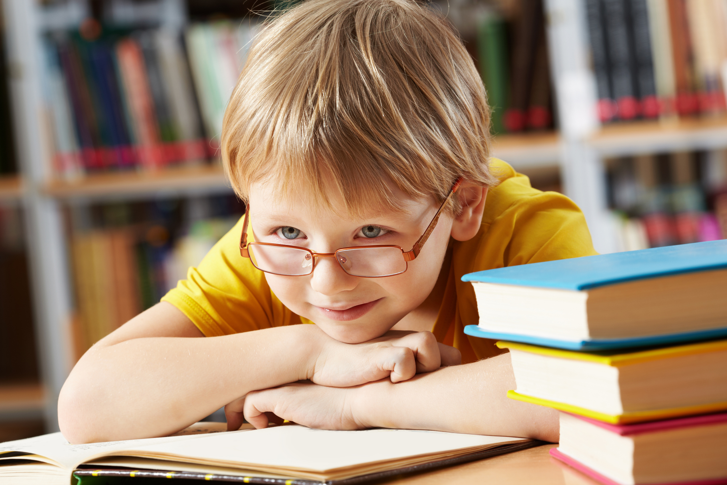 2 little-boy-smiling-library.jpg