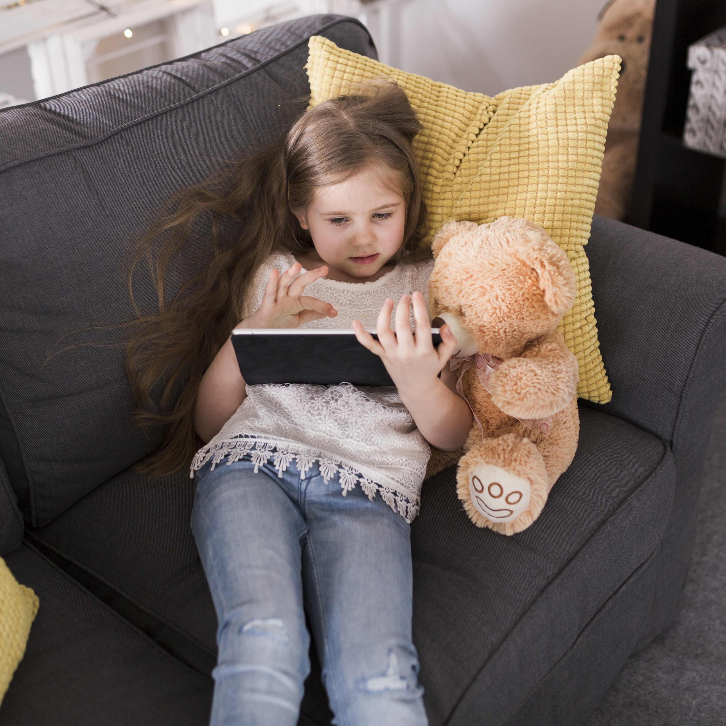 3 girl-with-tablet-teddy.jpg