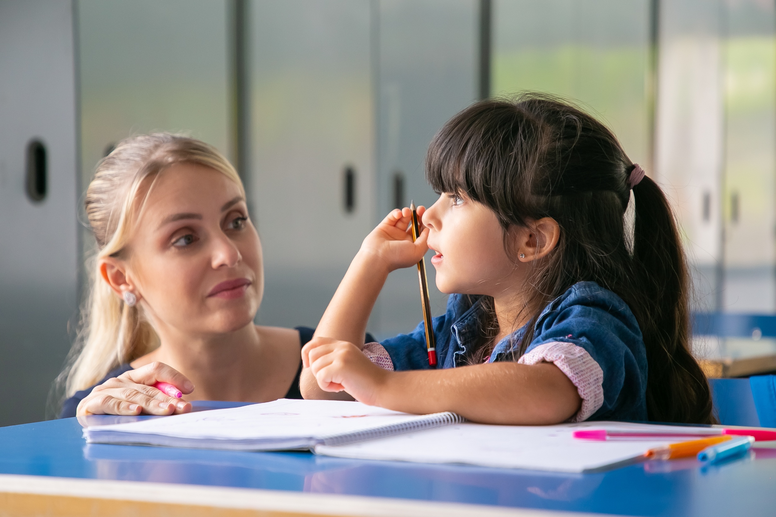 5 serious-female-teacher-discussing-task-with-little-pupil.jpg 5 serious-female-teacher-discussing-task-with-little-pupil.jpg