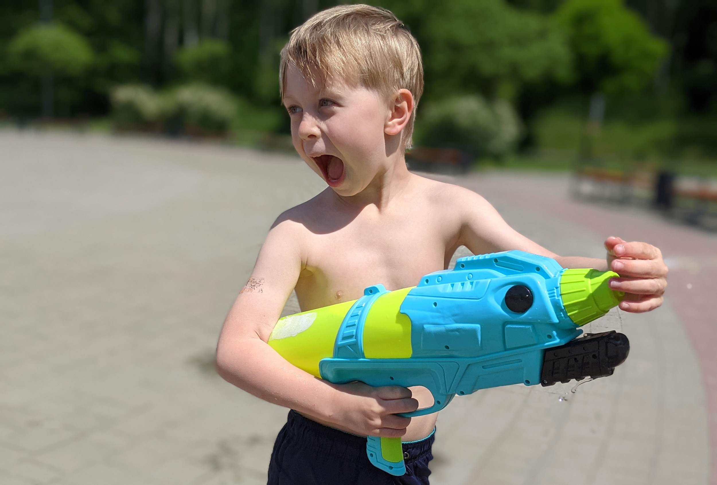 3 boy-child-playing-with-water-gun.jpg