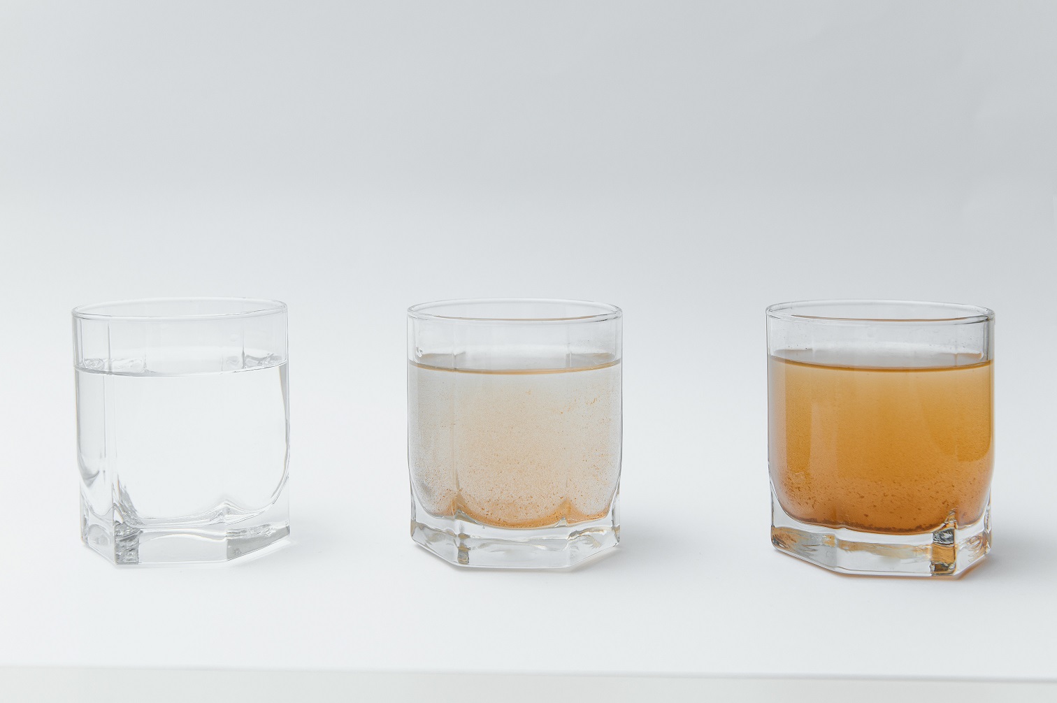 03 water-filters-concept-three-glasses-white-background-household-filtration-system.jpg