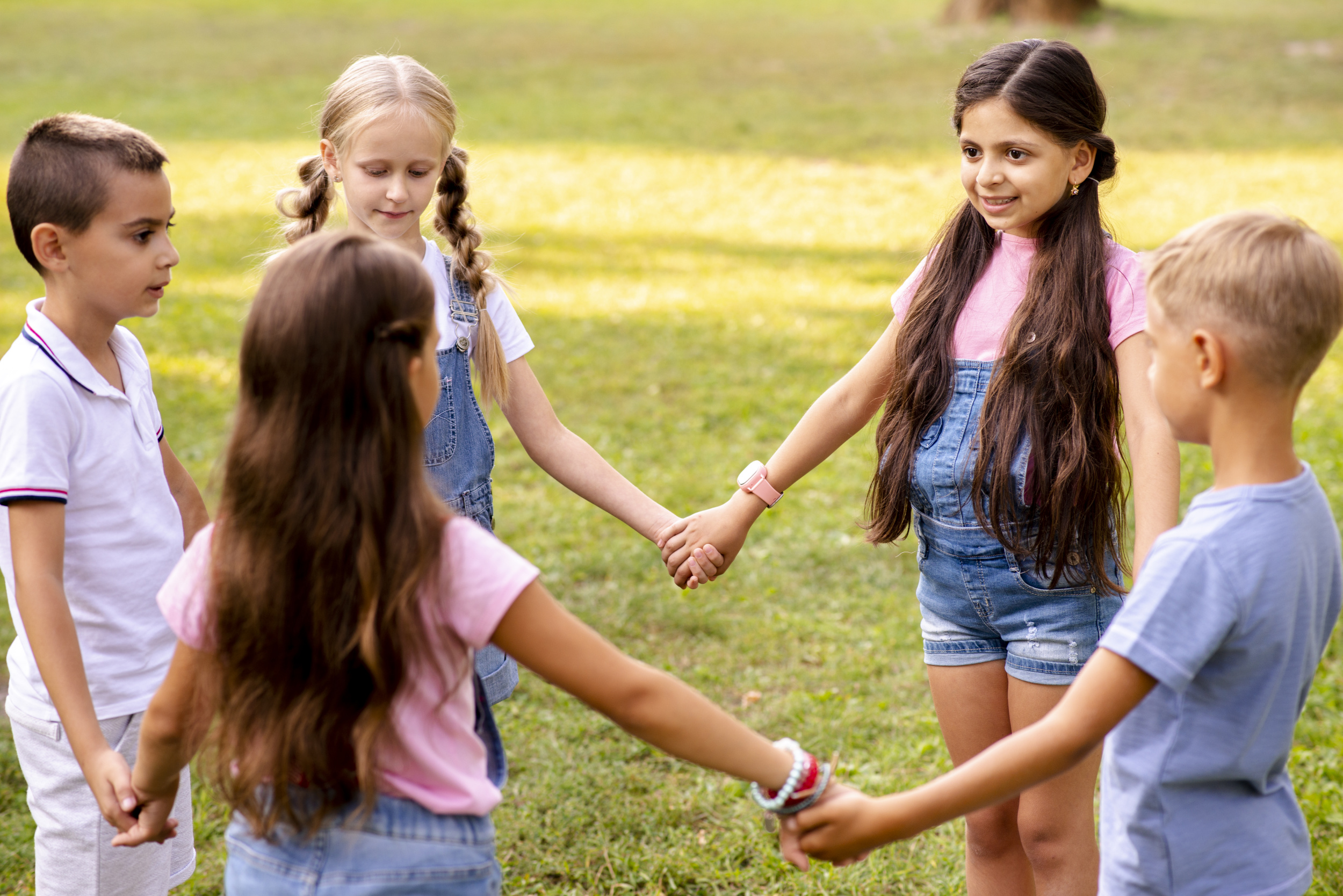 02 children-holding-hands-forms-circle.jpg