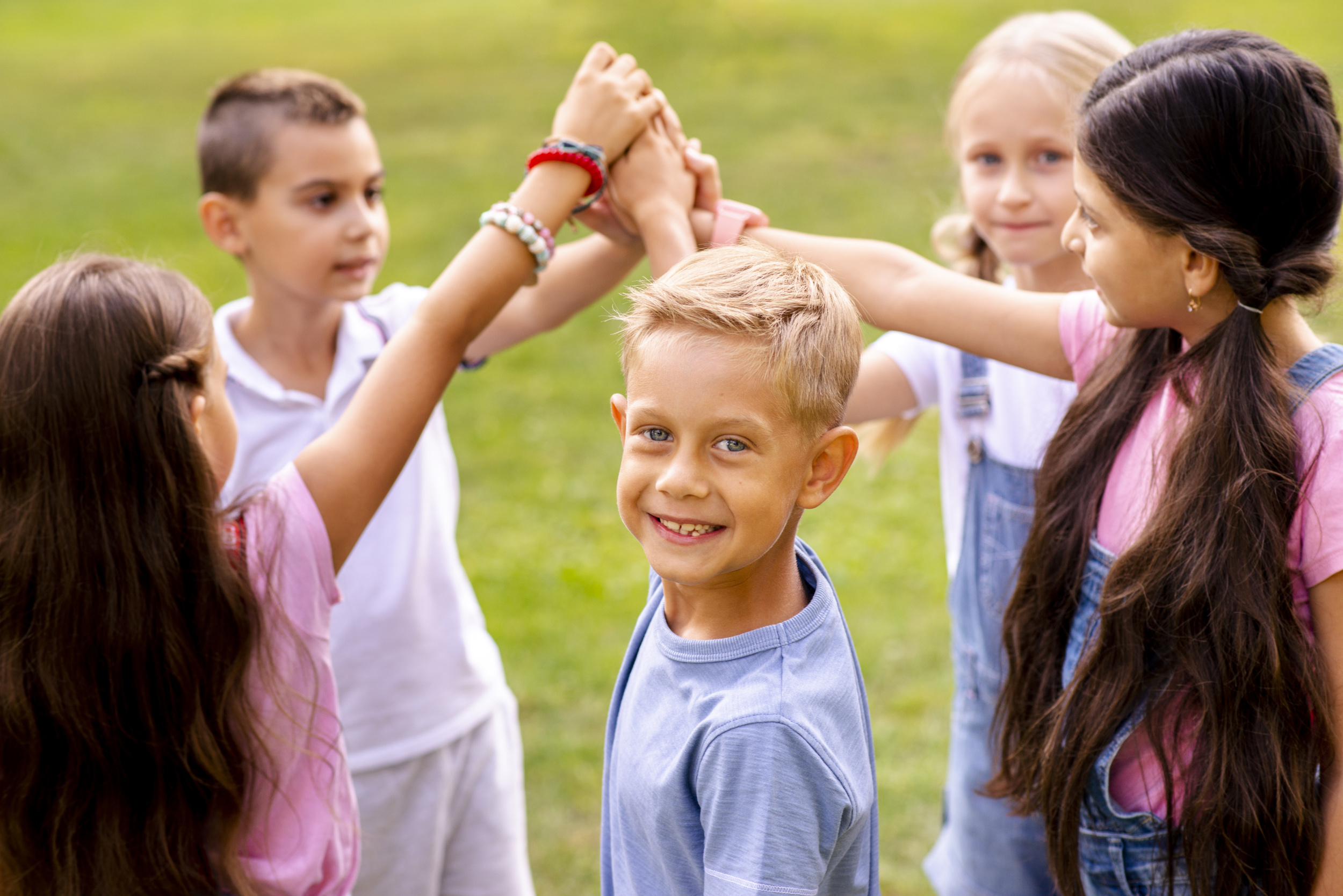 children-putting-their-right-hands-together.jpg