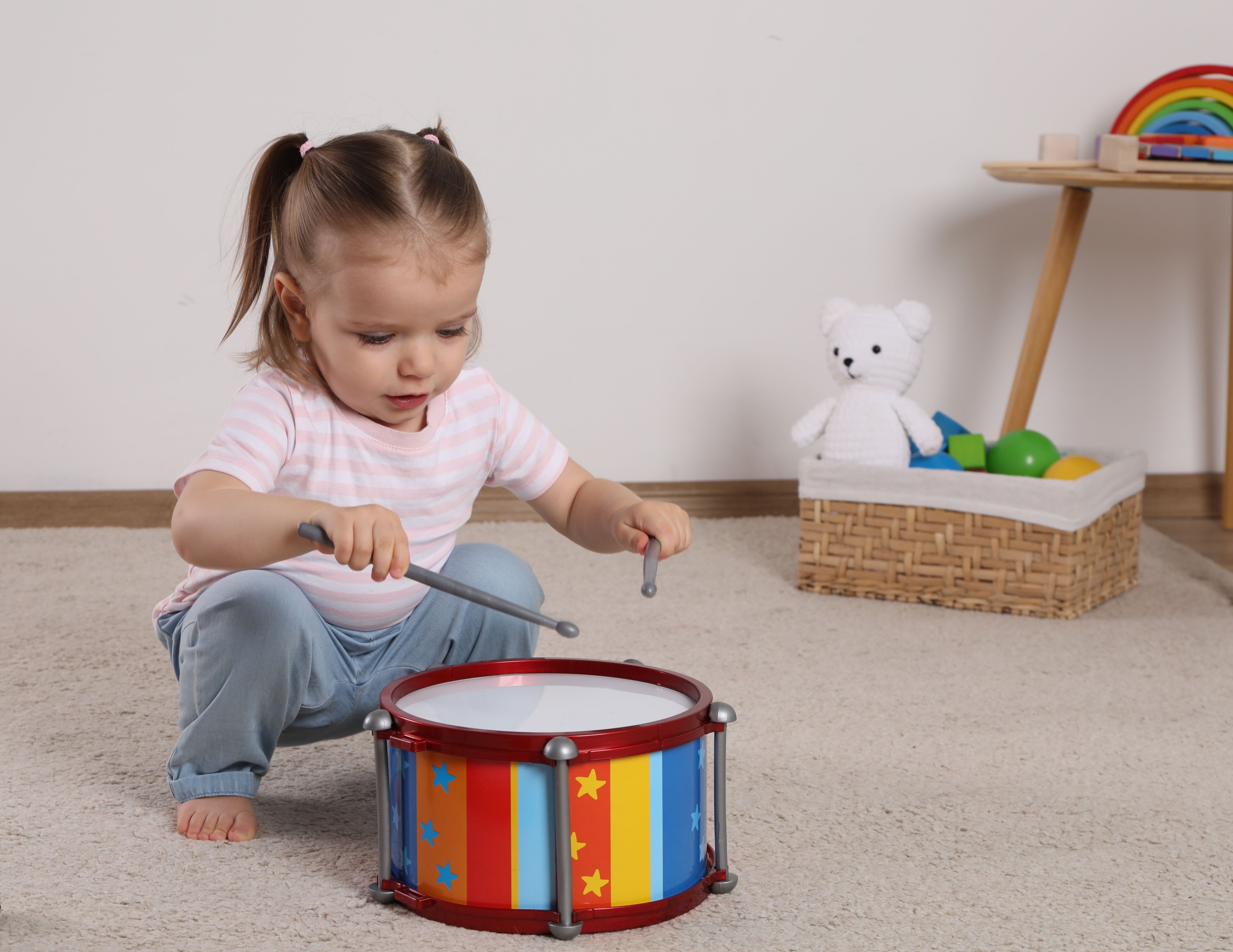 5 cute-little-girl-playing-with-drum-drumsticks-home.jpg
