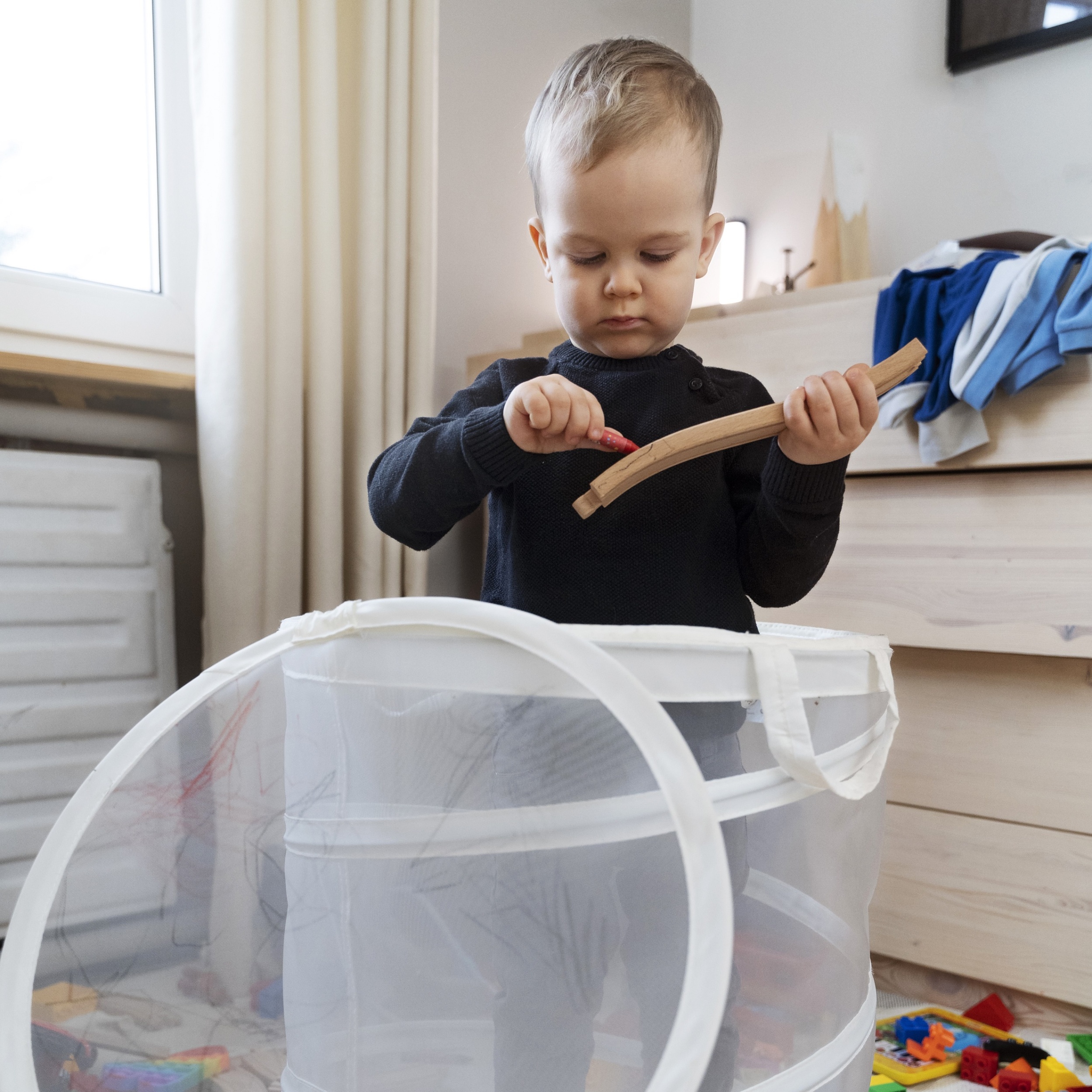 03 full-shot-kid-drawing-wooden-piece.jpg