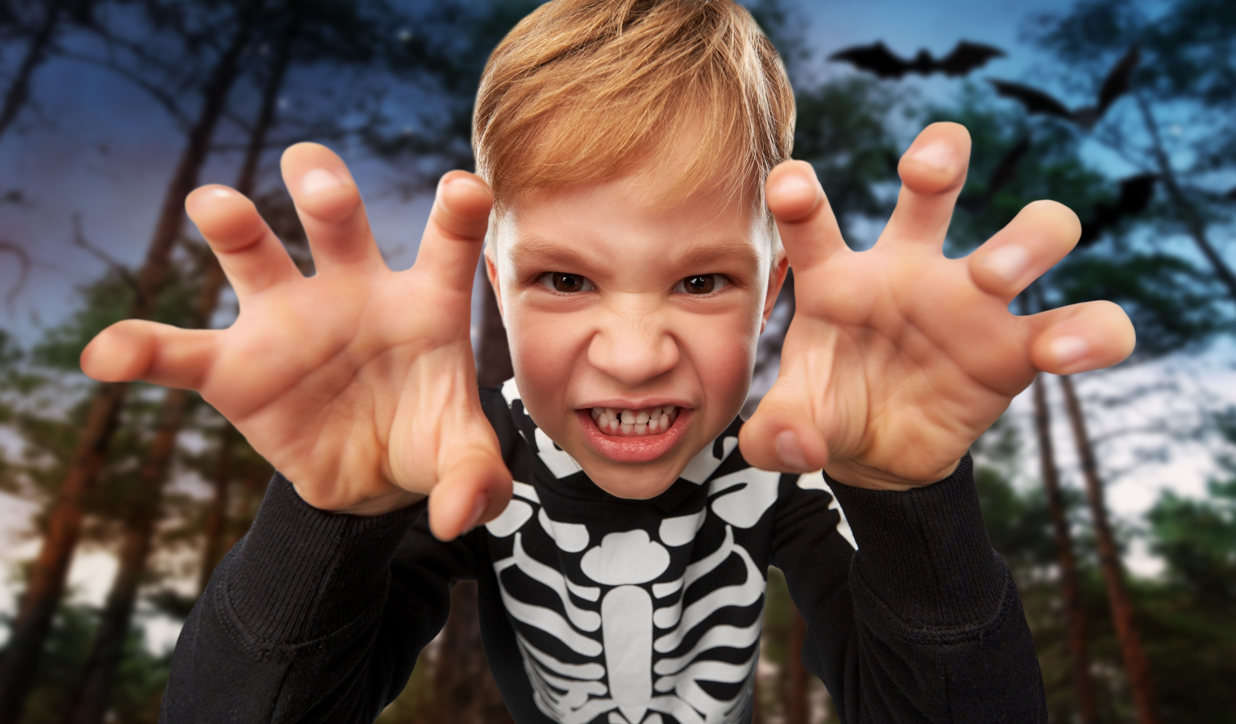 4 boy-halloween-costume-skeleton-making-faces.jpg