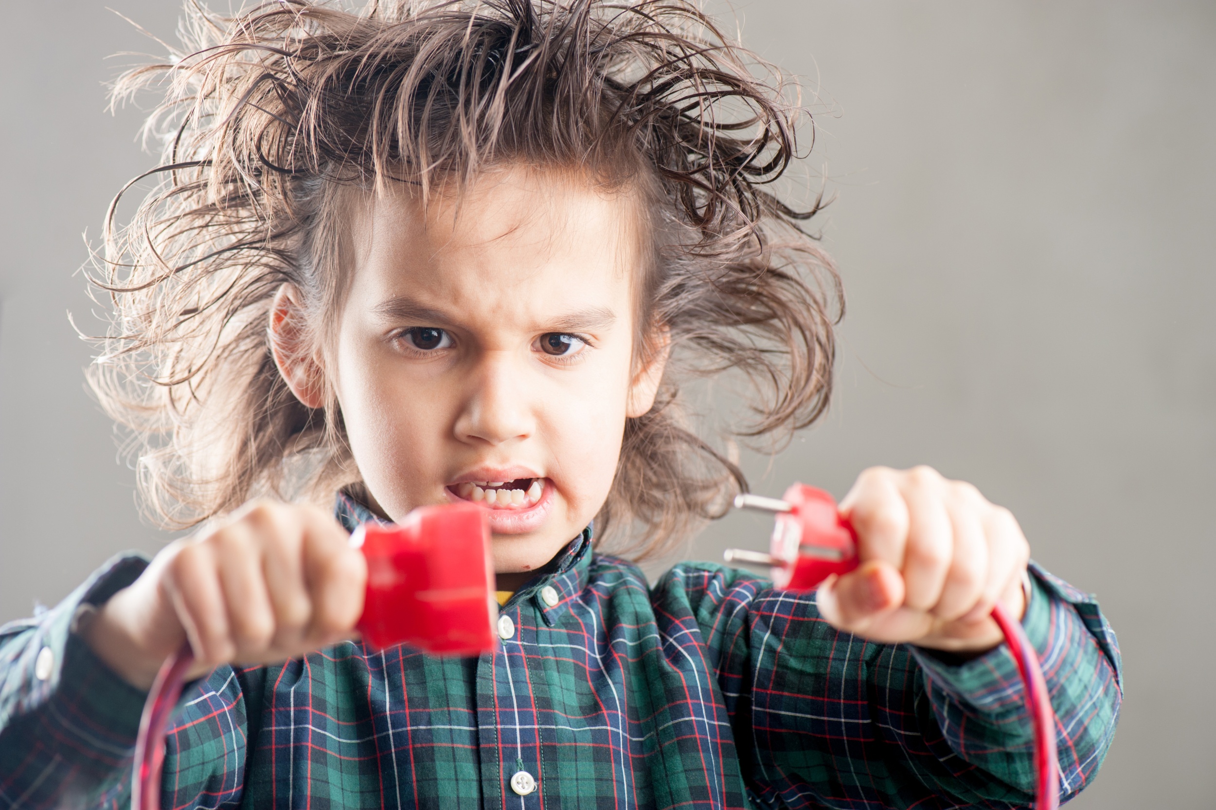 1 young-boy-holding-wire-connects-it.jpg