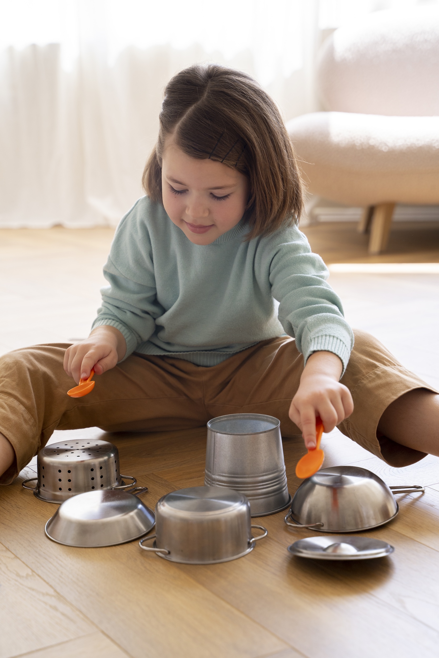 2 front-view-girl-playing-with-pots.jpg