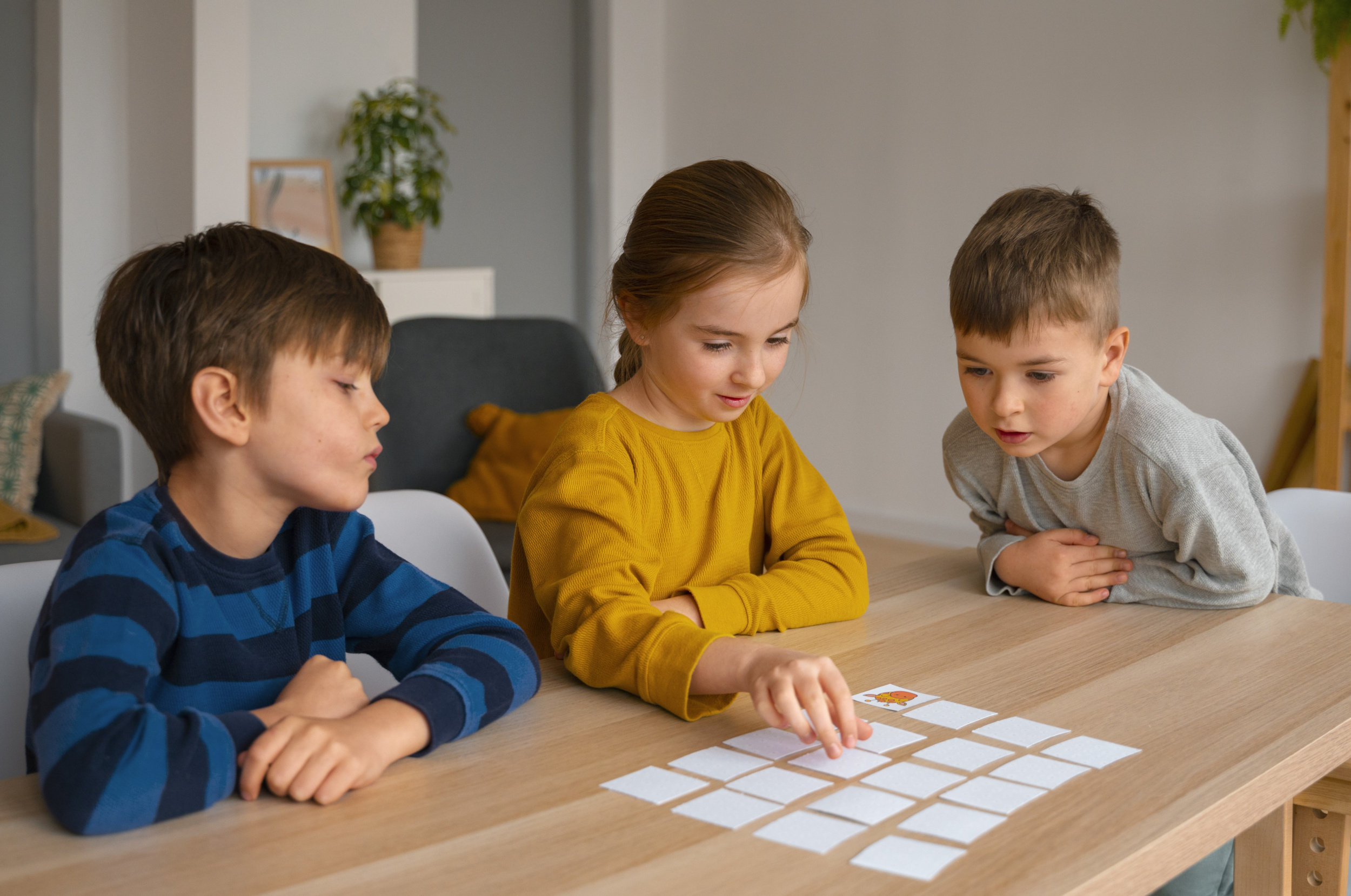 medium-shot-children-playing-memory-game.jpg