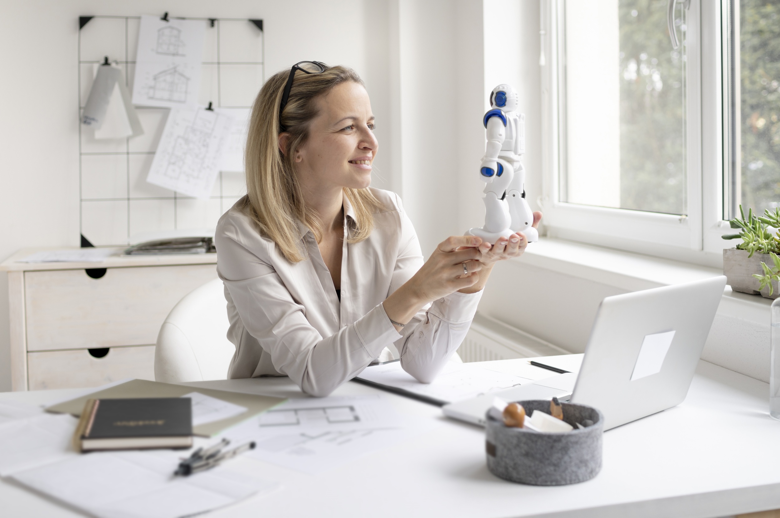 1 woman-looking-camera-while-sitting-table.jpg