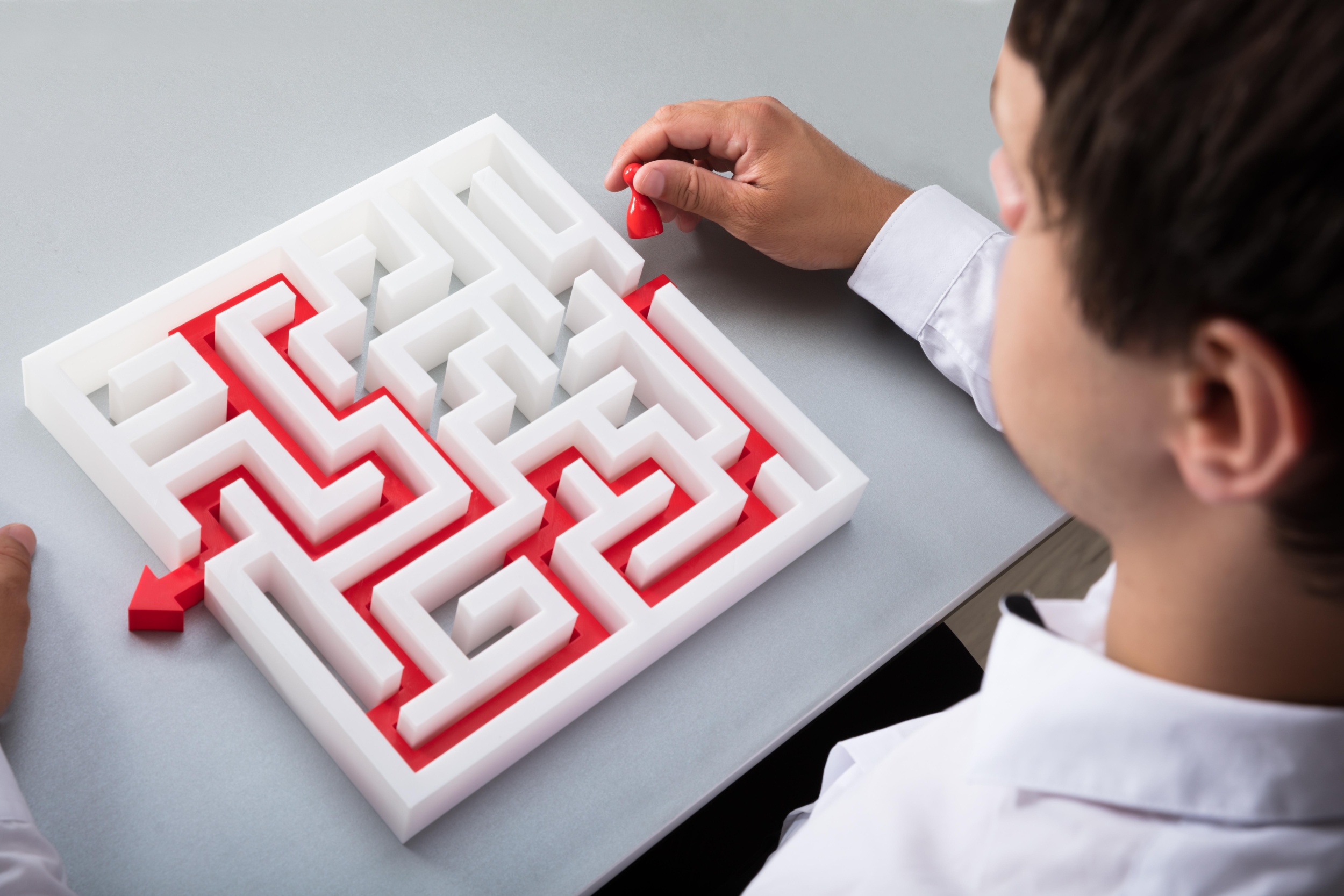 2 businessman-solving-maze.jpg