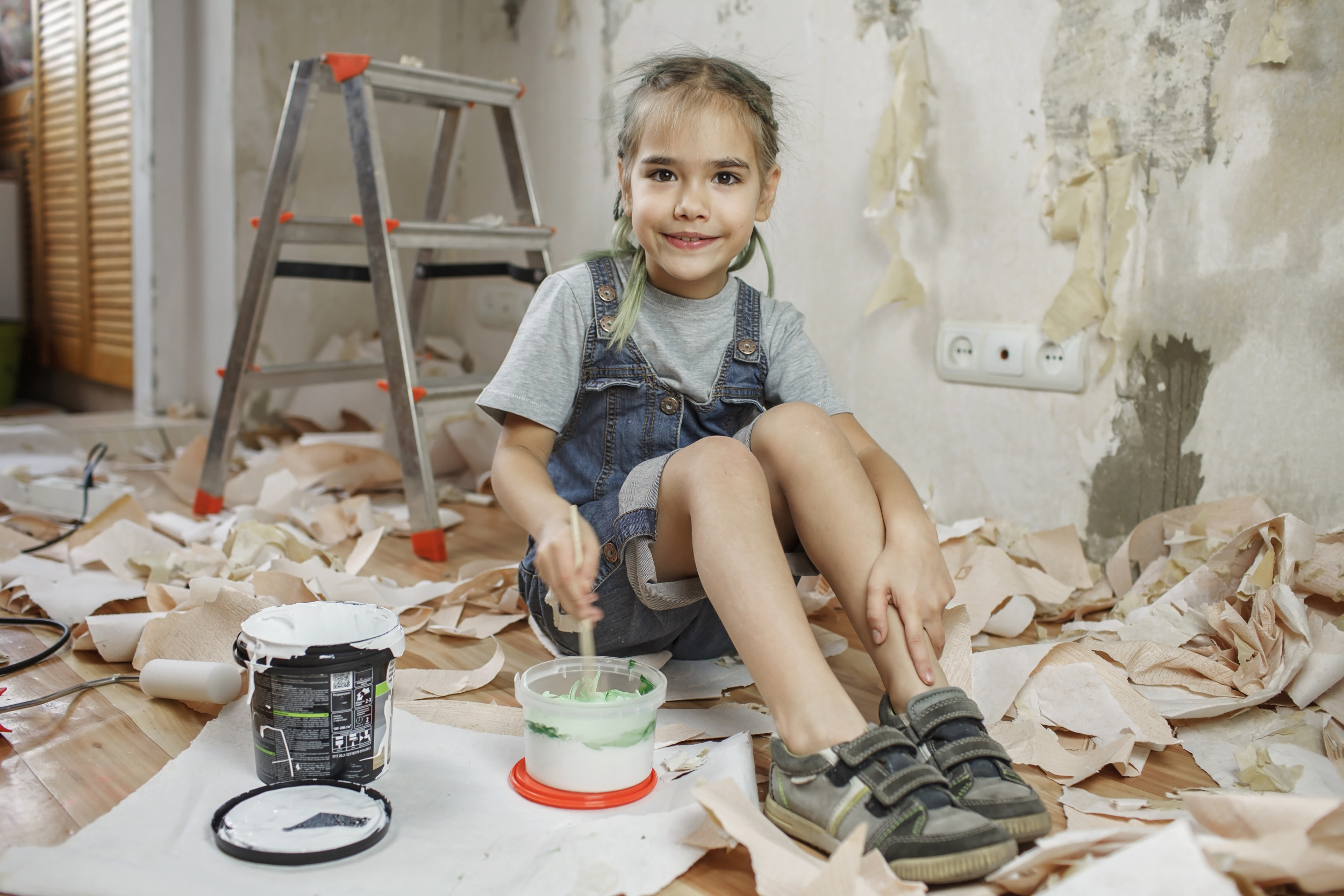 portrait-smiling-girl-working-while-sitting-home.jpg