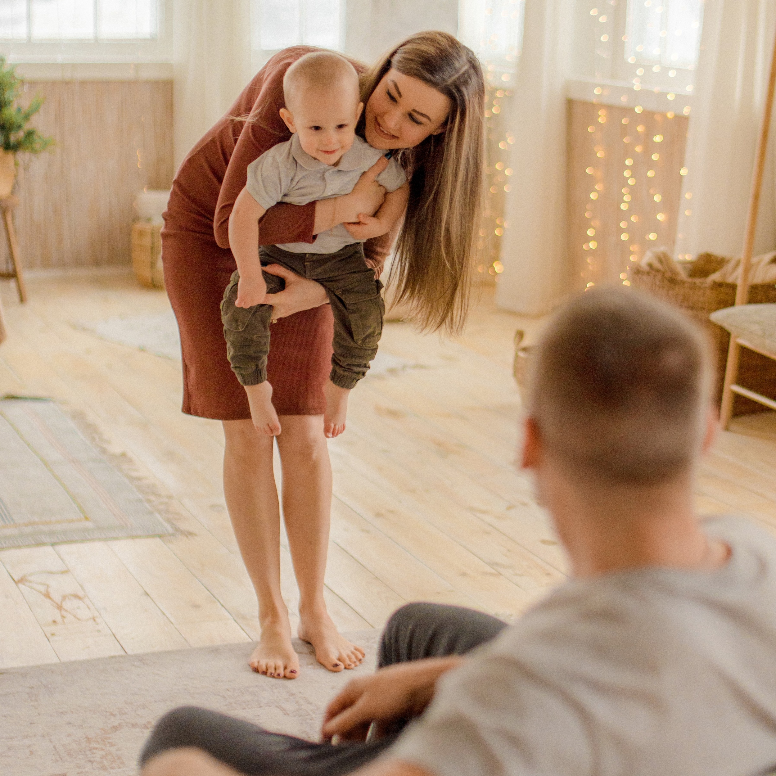 1 parents-playing-with-their-child.jpg