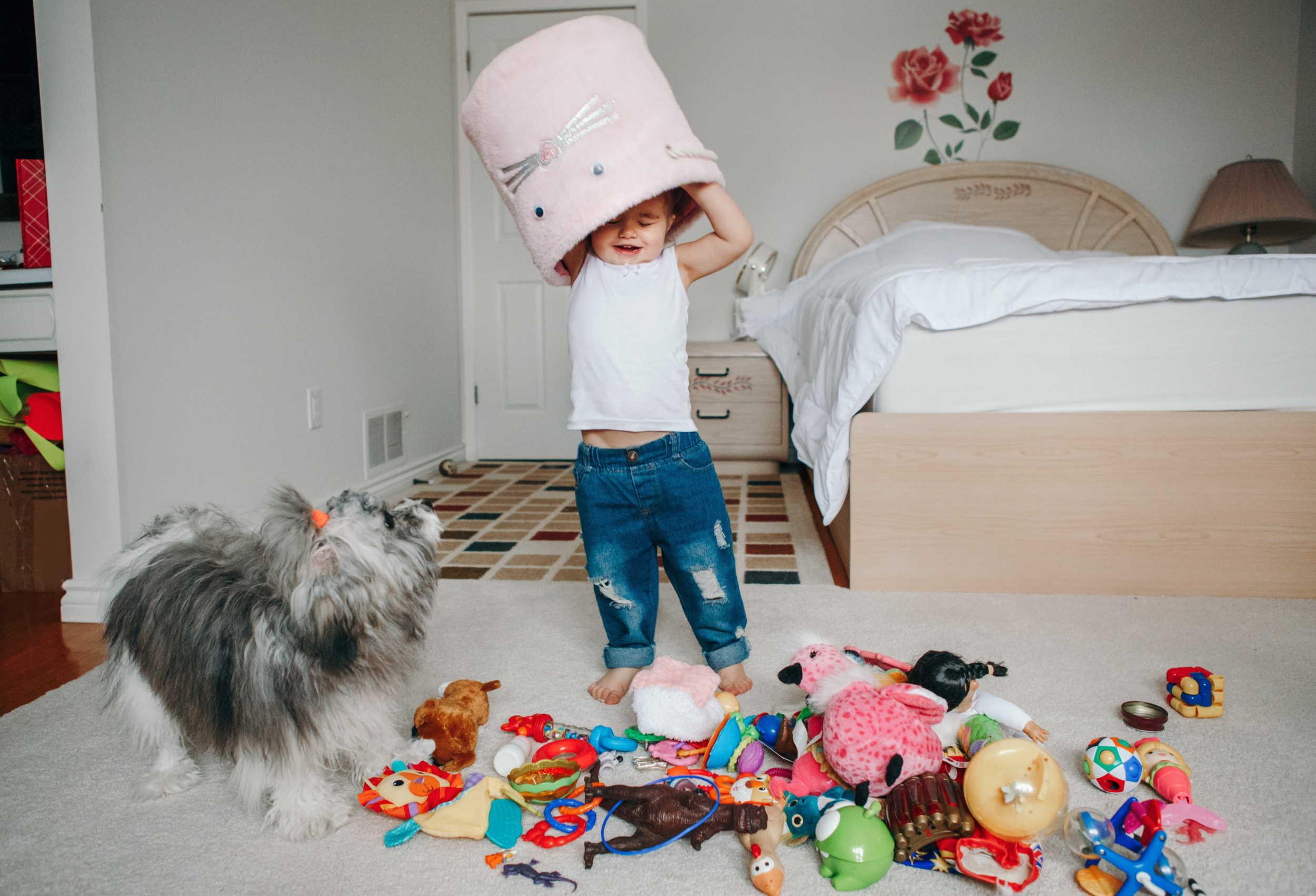 2 funny-baby-toddler-girl-with-toy-bin-head-kid-child-playing-with-toys-home.jpg