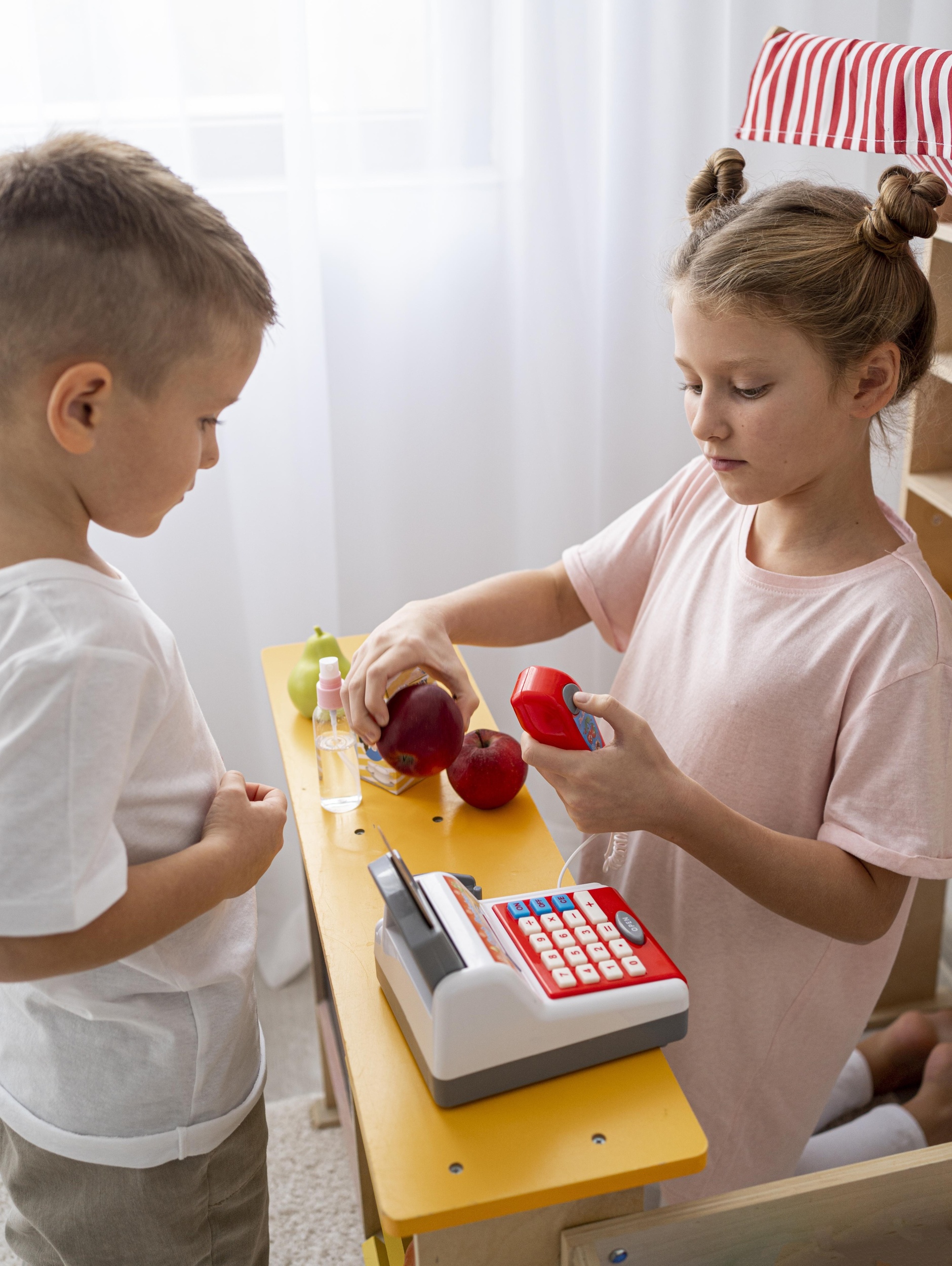 2 non-binary-children-playing-together-home.jpg