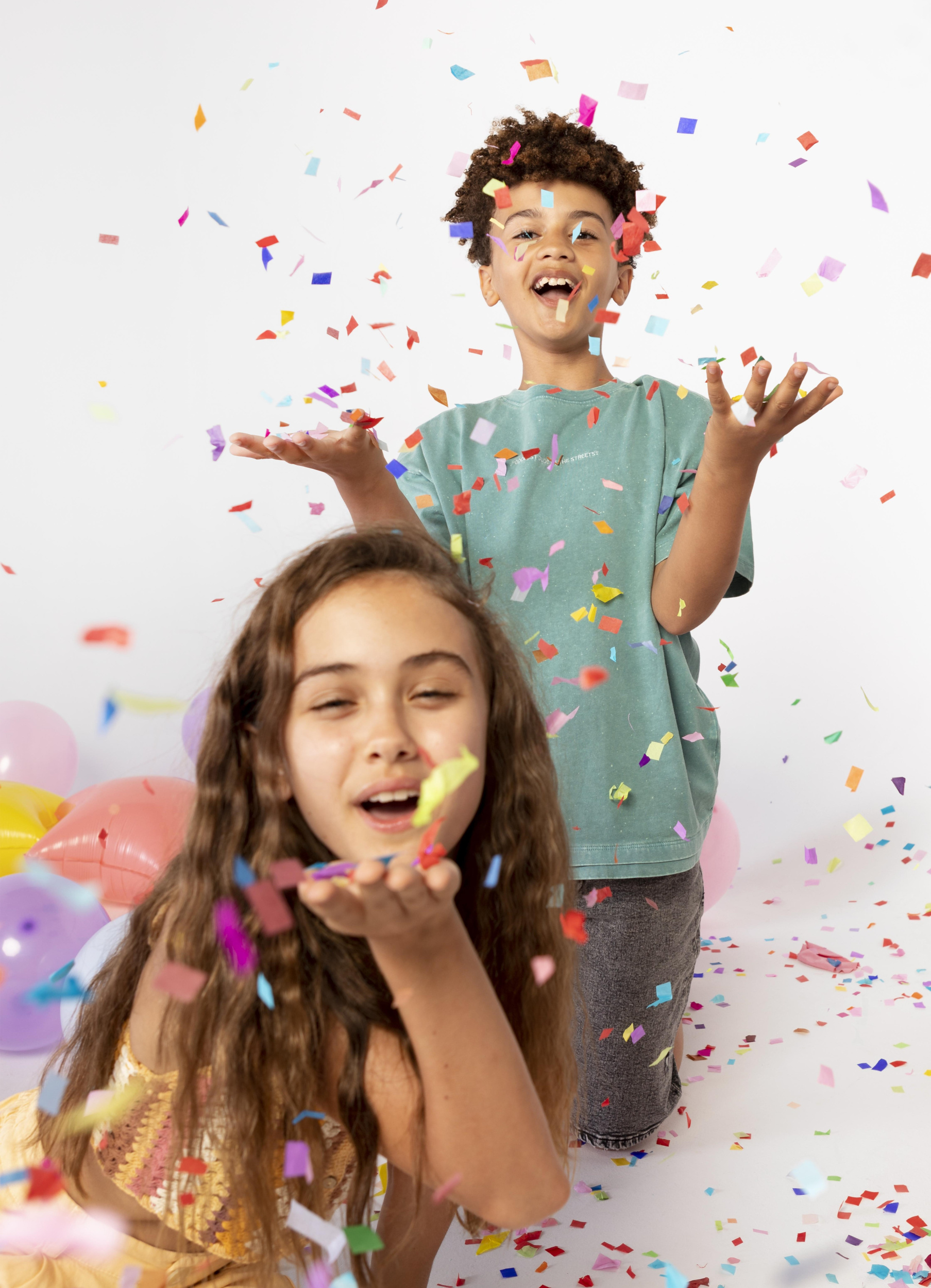 2 medium-shot-kids-having-fun-with-confetti.jpg