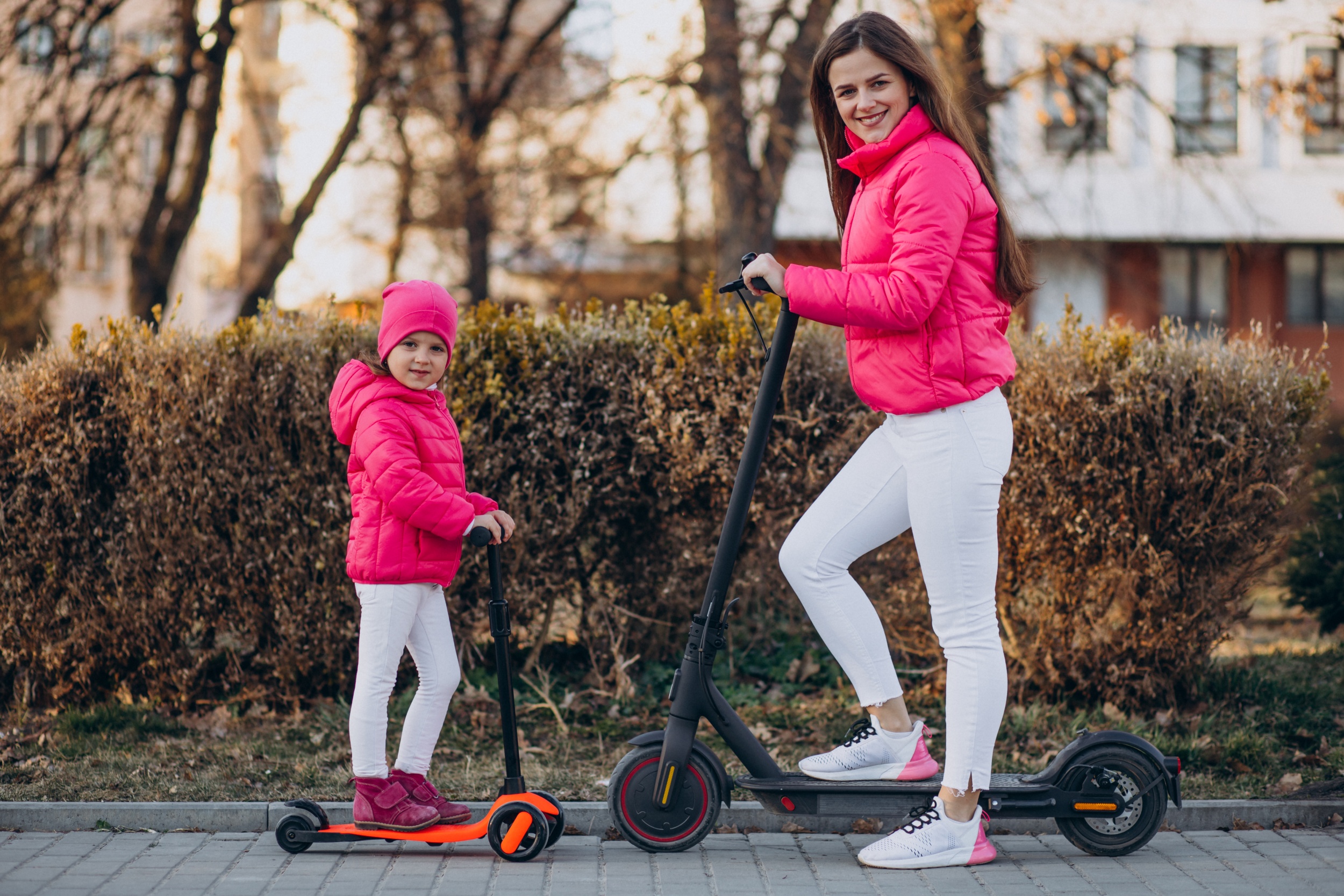 2 mother-with-daughter-riding-electric-scooter (2).jpg